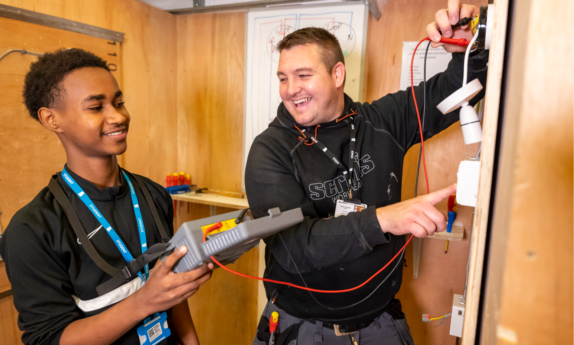 Teacher and student working together to transform lives